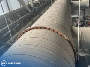High-Level Cleaning of Exposed Ducting and Pipework in a London Workshop